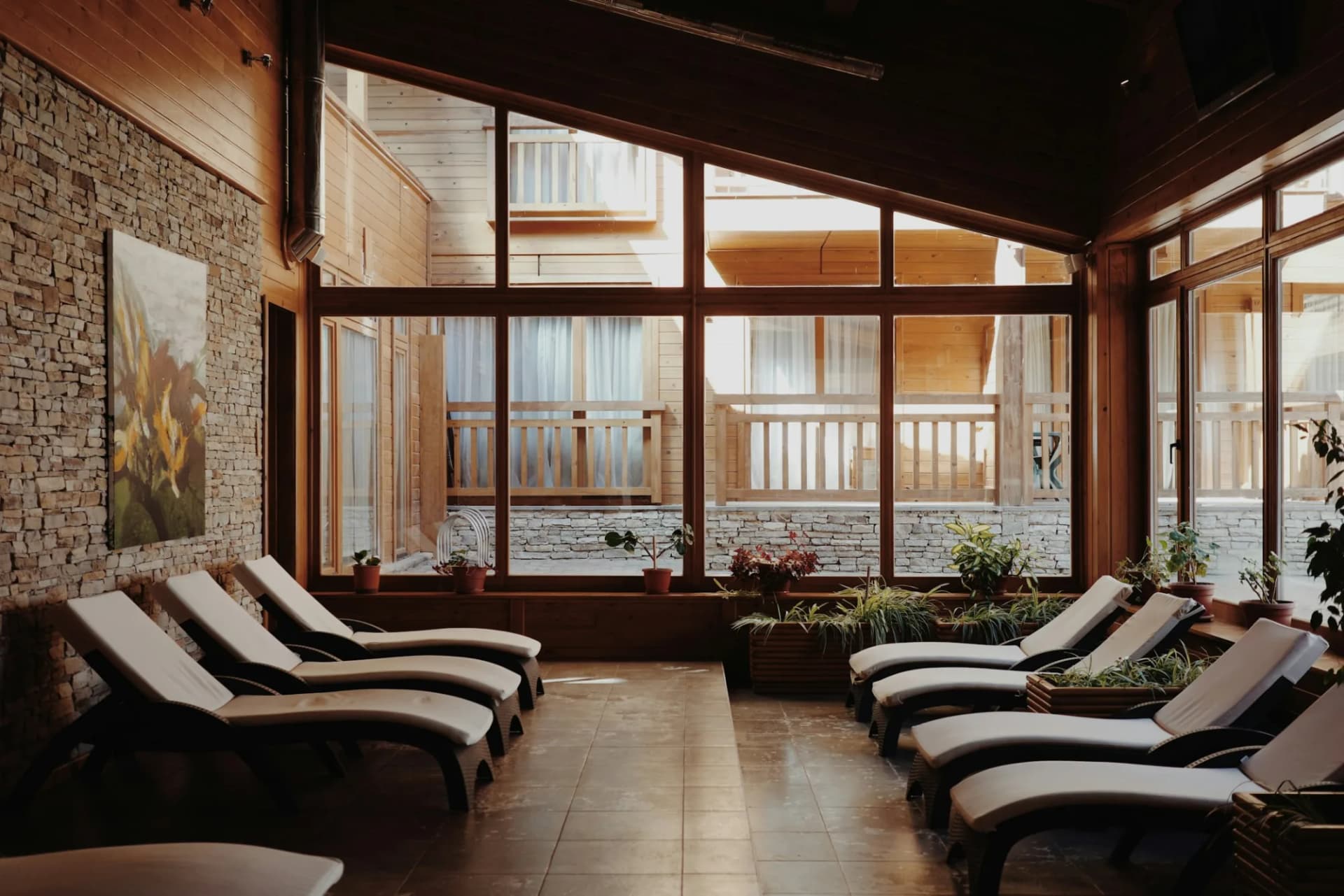 Sunlit lounge chairs in a spa